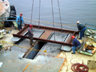 A-Frame foundation plates, precisely separated and held fast by an I-beam jig are fit in Jacksonville. 