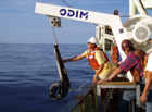 The clamps are lowered and ?drop off? the end of the core barrel, and are then hauled back up to the davits for recovery.