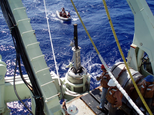  Final positioning proceeds.  The extruder, used to extract the previous core sample is still attached.