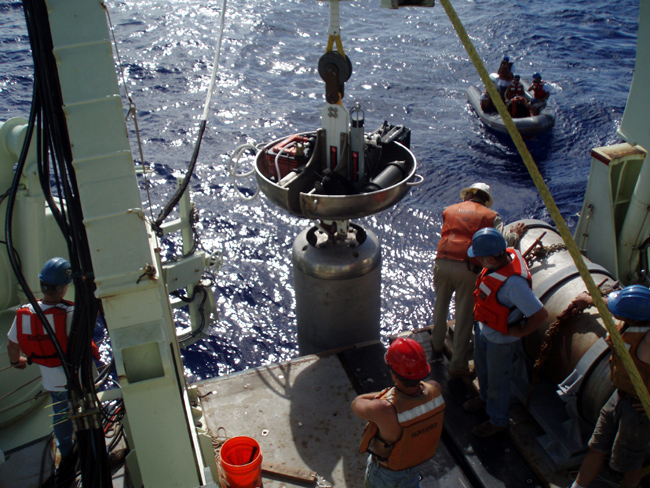 The fully rigged Long Core is free of the Grapple at the final stage of launch and is being lowered into the sea.