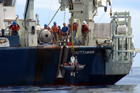 After pullout, the equipment returns to the surface.  The release module appears first, now separated from the Long Core.