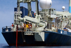 The Grapple returns the Long Core assembly to the starboard side.