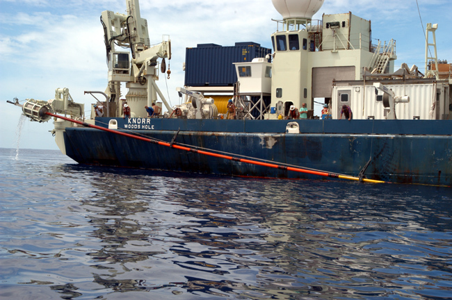  The Davits are engaged and the core barrel is hoisted to horizontal pivoting at the Grapple.