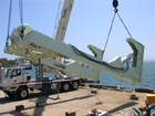 The Allied A-frame being hoisted for installation on Knorr at the WHOI Iselin Marine Facility. 