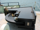 Stern sheave casette awaiting fitting and installation onboard Knorr.  Nylatron sheave insert, foundation pins and instrumentation are visible on the right.