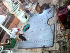 The ?Superdeck Module? being fit.  The four large holes in a rectangular pattern [middle of the photo] are reinforced deck sockets where specially designed pins will be installed to secure the main ODIM winch.