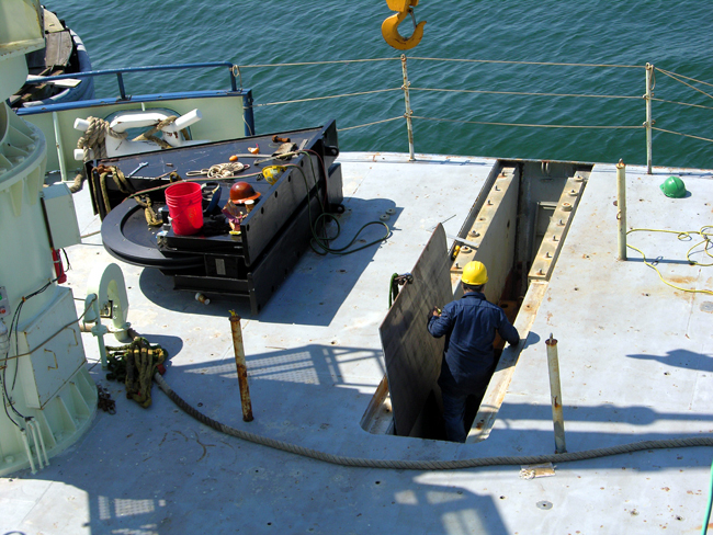 Stern sheave cassette on deck as work proceeds on the foundation.  The Nylatron wheel, specially grooved for the Long Core fiber rope has a root diameter of 60 inches.