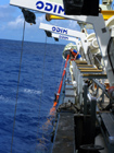 The starboard davits are programmed to tip the core from horizontal to vertical with a single joystick in control.