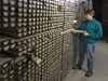 Assistant Curator Ellen Roosen examines cores in the WHOI Seafloor Samples Laboratory.