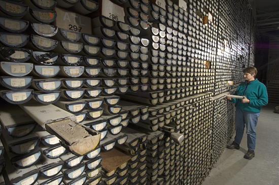 Assistant Curator Ellen Roosen examines cores in the WHOI Seafloor Samples Laboratory.