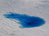 Supraglacial lakes may concentrate water so that it causes the ice to fracture and water to be injected directly to the bed, where the ice meets the ground.