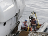 Matthew Barton, up close and personally video taping Alvin deployment.