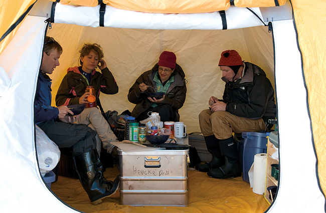 team prepared meals and hot drinks over a gas stove in a 10-by-10-foot cook tent