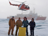 WHOI researchers and engineers pose next to float of an ice-tethered profiler they just deployed in the Beaufort Sea
