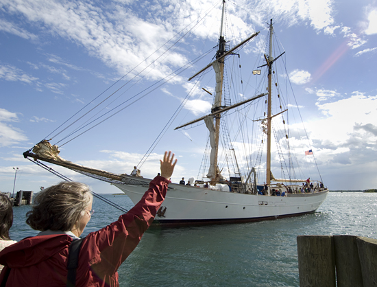 BL Owens waving goodbye to the SEA schooner Corwith Cramer.