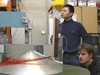 Graduate students Jinbo Wang (left) and Evgeny Logvinov.