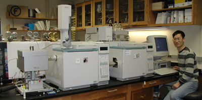 Dr. Li Xu, a specialist skilled in the preparative separation of organic compounds, shown here operating the two-dimensional PCGC in 2004. 