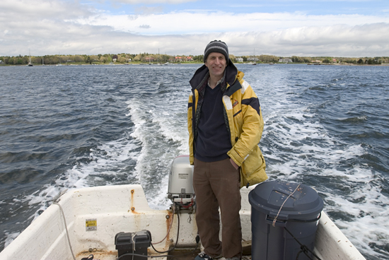 WHOI Marine mammal biologist and veterinarian Michael Moore has developed numerous techniques for working with whales from small open boats, including mechanisms for delivering medicines to whales.