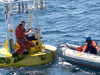 WHOI UOP group conducting at-sea repair on an ASIMET buoy.