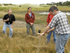 Jeff Donnelly gives coring demonstration at Woodneck beach to the 2006 Ocean Science Journalism Fellows.