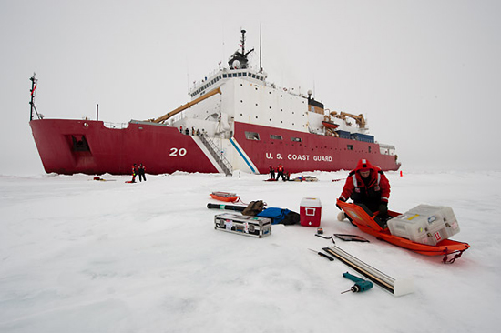 scientist preparing gear on ice