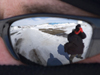 Mike Carlowicz's sun glasses reflecting Chris Linder taking his photo.