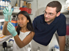 Summer Student Fellow Amy Kidd and CICOR Postdoctoral Scholar Jeremiah Hackett study the genetics of toxic algae in the culture lab.