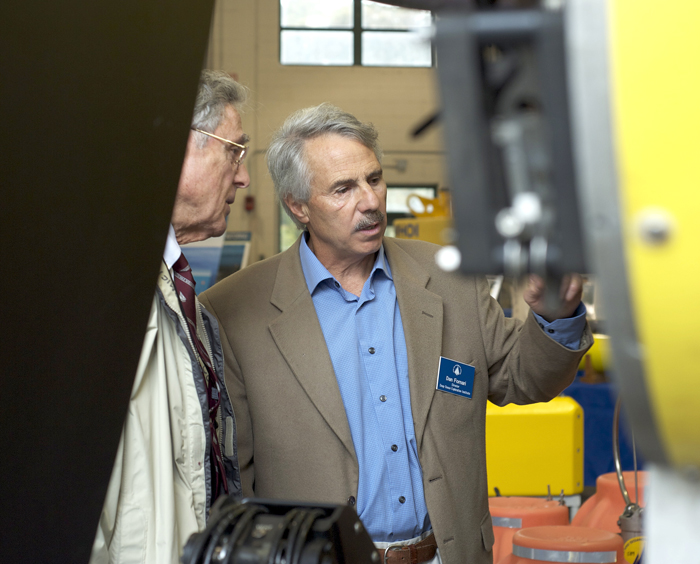 DOEI Director Dan Fornari shows Life Trustee Peter McCormick some of the features of Nereus.