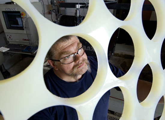 WHOI Machinist Dave Hamblin making polypropylene racks that will hold ceramic spheres in Nereus (HROV).