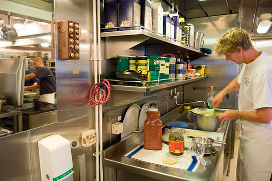 Rob Reves-Sohn preparing a Mexican meal for the cruise crew.