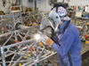 Lead Welder Geoffery Ekblaw working on the assembly of the HROV (Nereus) frame in the welding shop.