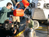 Seewald and Sievert dousing Ann Curry with water
