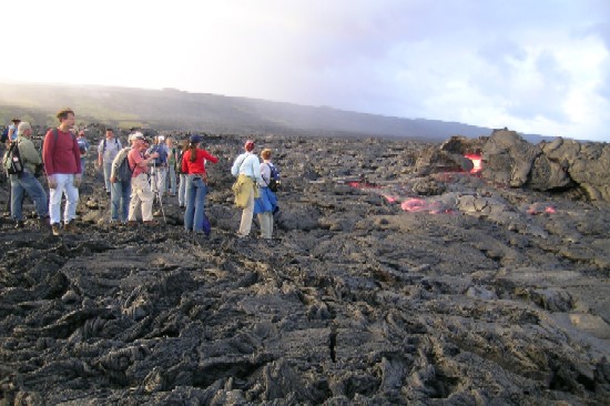 We had the wonderful opportunity to see flowing lava up close. Here we are watching a tumulus that has broken open revealing the 1200 deg C, incandescent