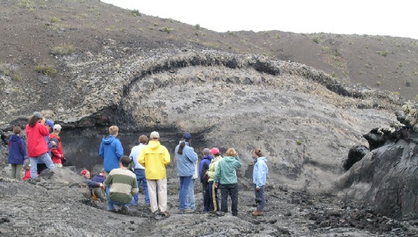 This unique feature shows where lava sloshed up the side of a channel during the December 1974 eruption of Kilauea Volcano.