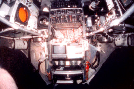 Looking aft at science electronics rack