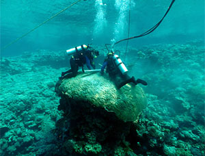 Konrad Hughen and Research Assistant Justin Ossolinski drilling a long core