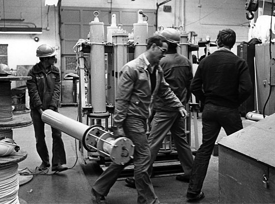 Jerry Dean and colleague carry a current meter