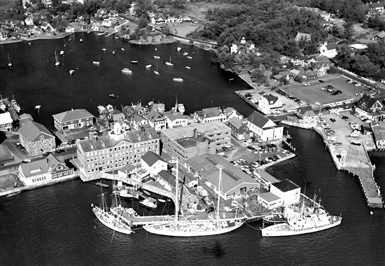 Aerial view of R/V's Aries, Atlantis, Crawford, and Bear at WHOI dock.