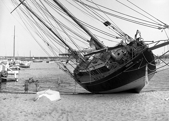 boat beached by hurricane carol