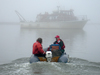 On a gray day in August 2006, WHOI research associate Phil Alatalo (right) and Captain Bill Kopplin motored out to the R/V Annika Marie at Barrow, Alaska.