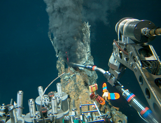 Alvin submersible reaches out for a sample from a 