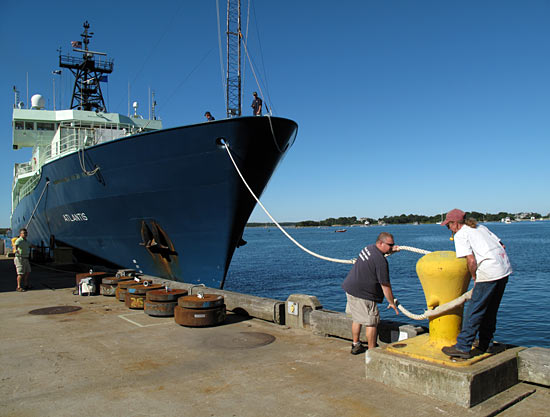 WHOI dock workers make the bow of Atlantis fast
