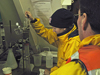 Bryn Warren and Luciano Fernandes process mud samples for Red Tide Cysts in Oceanus wet lab.
