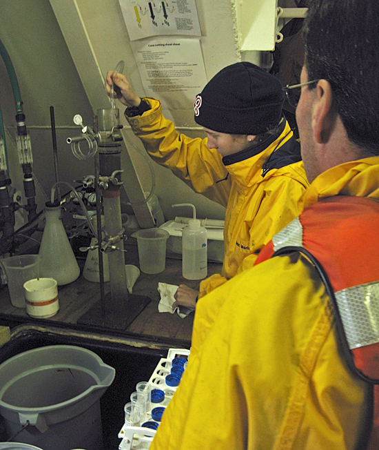 Bryn Warren and Luciano Fernandes process mud samples for Red Tide Cysts in Oceanus wet lab.