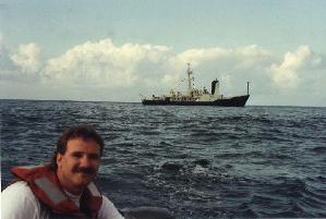 Chris Griner in command of Achilles Inflatable. Oceanus in background.