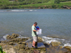 Paul Henderson collecting sample