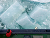 Ice chunks off the side of Oden.