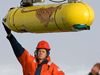 Mike Jakuba of Johns Hopkins University guided the robotic underwater vehicle Jaguar back on board.