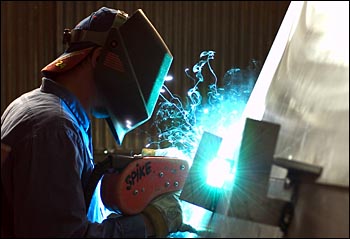 Welder working on Tioga