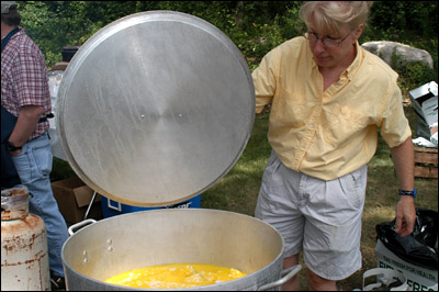  	Ellen Bailey with a big pot of corn